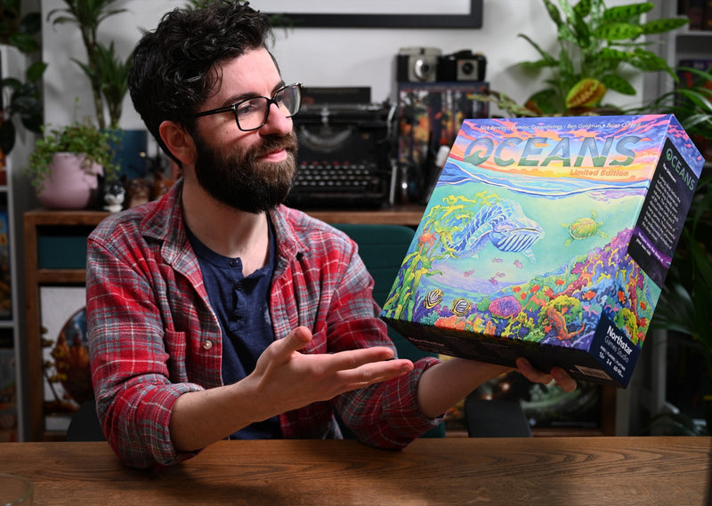 From board game photography to scuba diving, get to know our new marketing manager Ross! - North Star Games